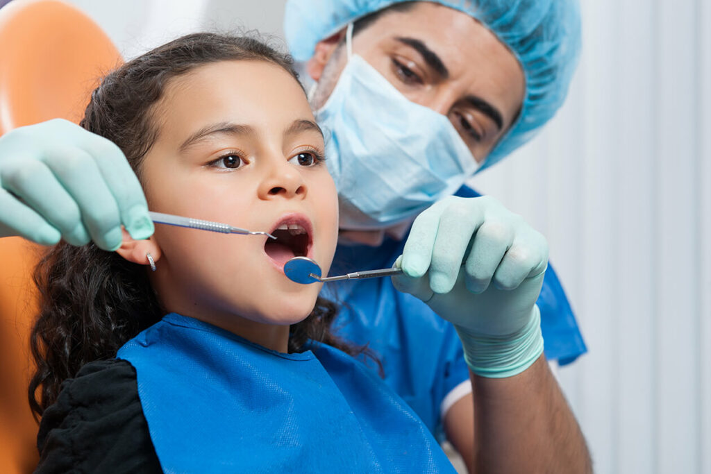 How To Care For Your Child’s Teeth: A Guide For Parents